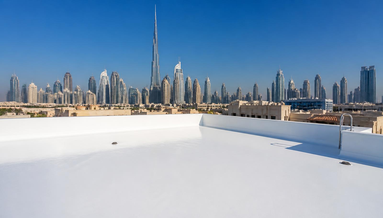 Dubai rooftop after professional waterproofing with a seamless white reflective coating